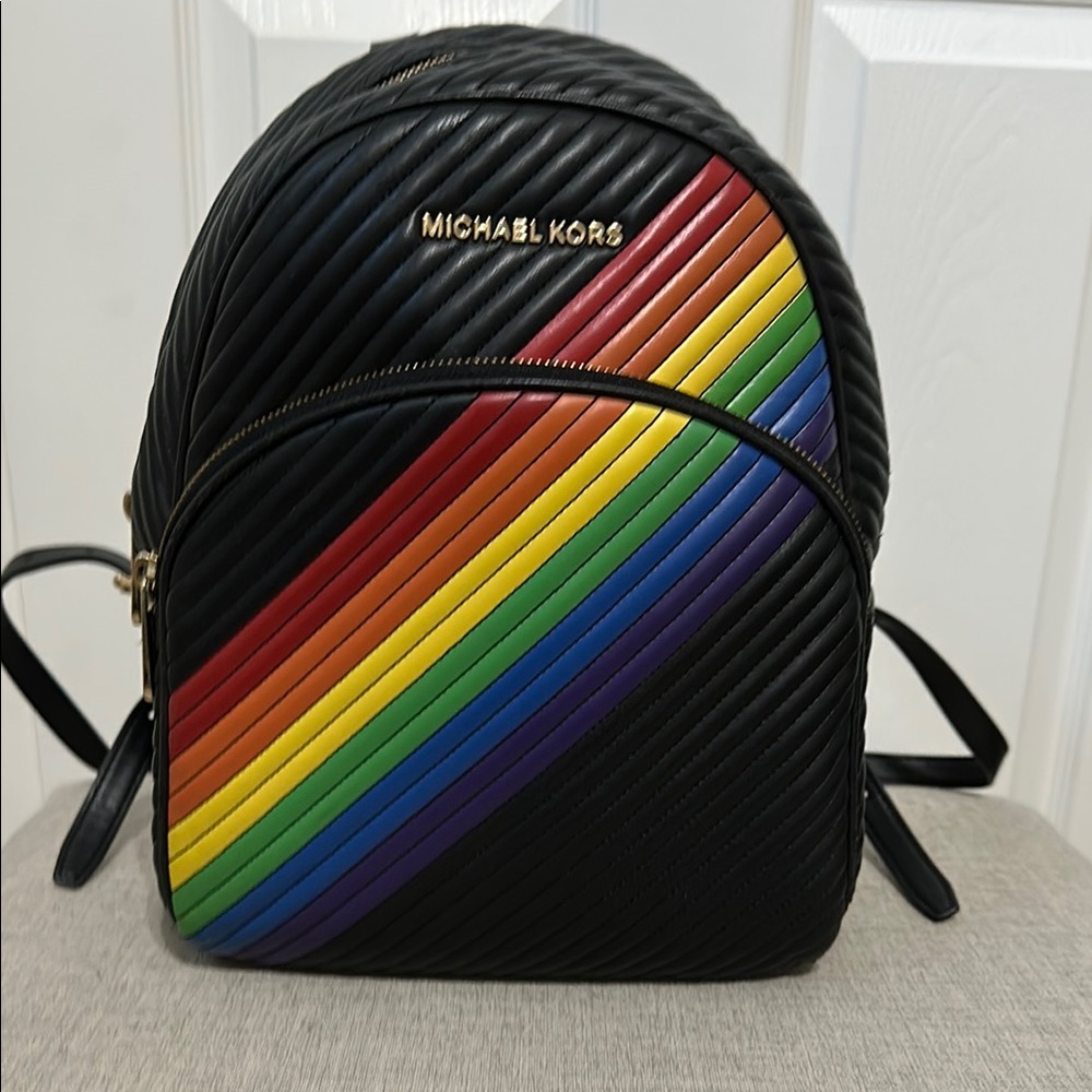 Michael Kors Black Rainbow Abbey MD Backpack.
